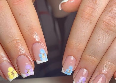 Floral nail art at Nails by Eils, Kirkcaldy, Scotland, GB showcasing soft pastel colors and intricate design.