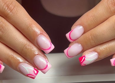 Stylish pink and white nail art at Nails by Eils, Kirkcaldy, Scotland, GB, showcasing intricate designs.
