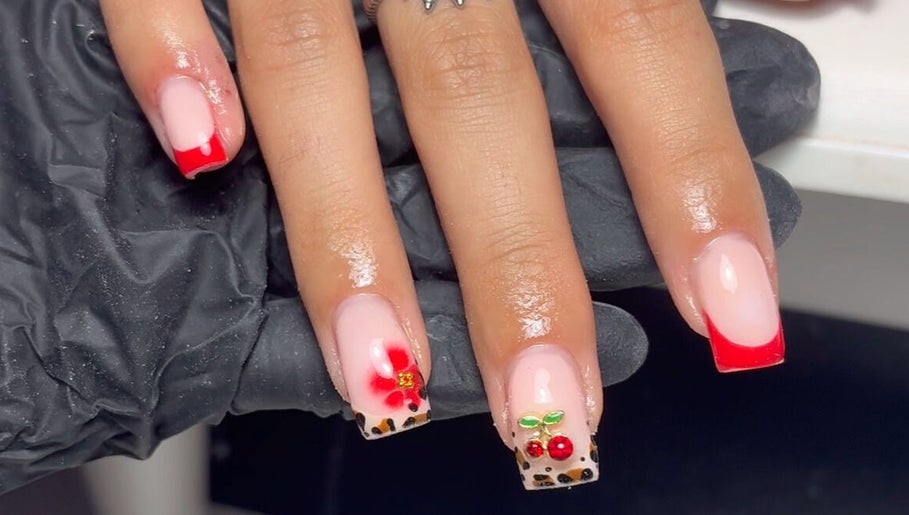 Cherry-themed nail art with red tips at Nails by Eils, Kirkcaldy, Scotland, GB.