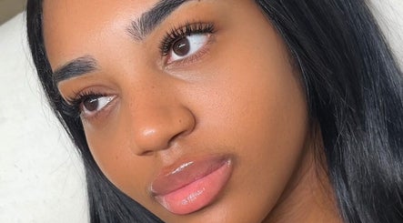 Close-up of a woman's radiant skin and lush lashes at Bynndll, Ajax, Ontario, CA.