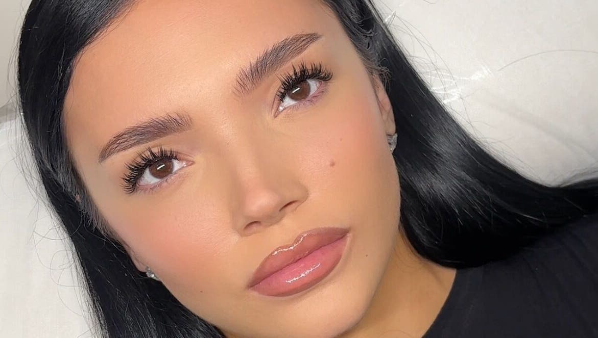 Close-up of flawless skin and long lashes at Bynndll, Ajax, Ontario, CA showcasing beauty services.