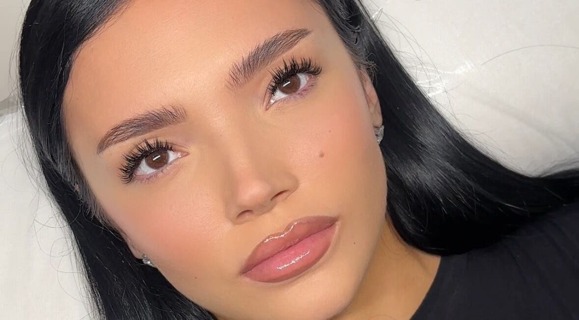 Close-up of flawless skin and long lashes at Bynndll, Ajax, Ontario, CA showcasing beauty services.