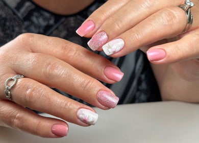 Elegant pink and floral nail art at Nail Perfection, Armstrong, British Columbia, CA.