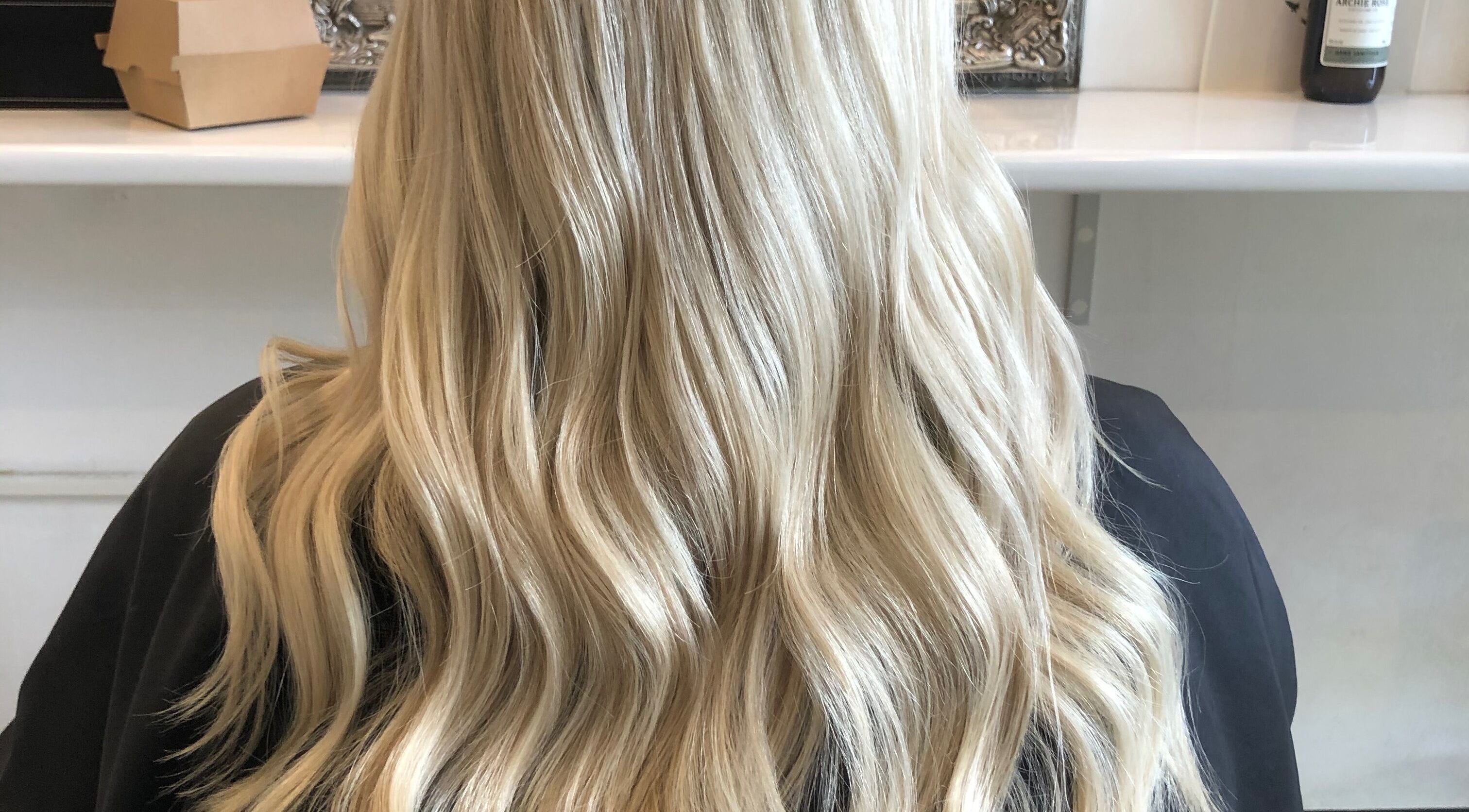 Blonde wavy hairstyle showcased at Hair By April and Co., Greenpoint, New South Wales, AU.