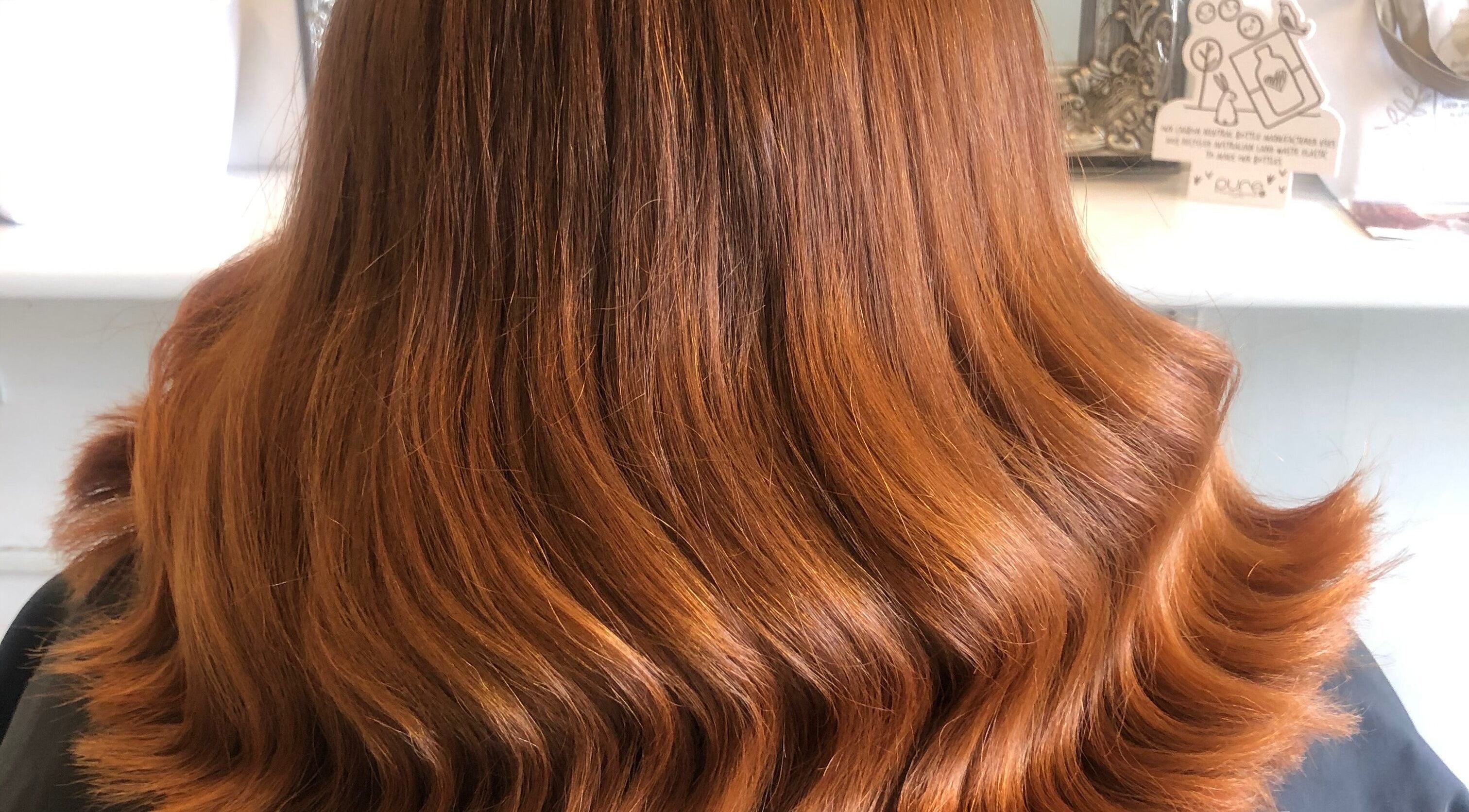 Beautiful ginger waves styled at Hair By April and Co. in Greenpoint, New South Wales, AU salon.