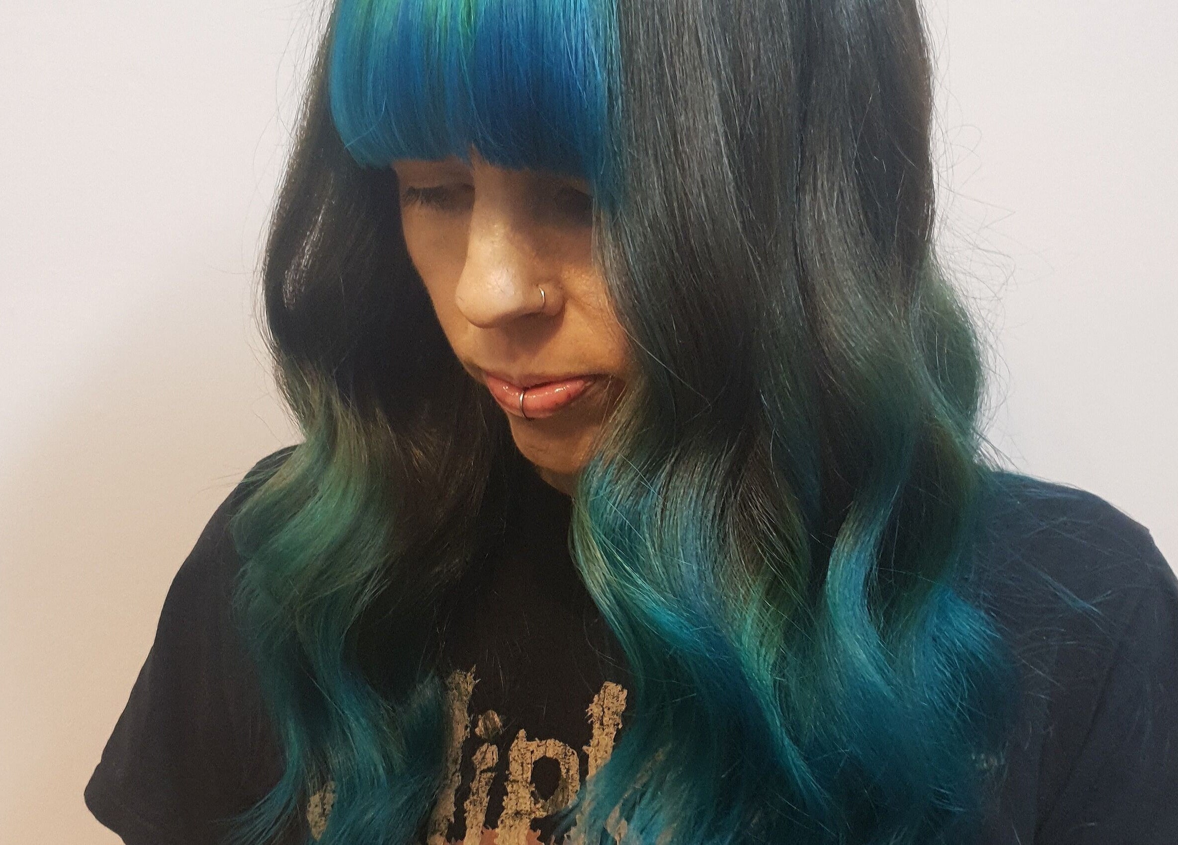 Vibrant, multi-toned blue and green hair at Louise Frances, Derby, England, GB.