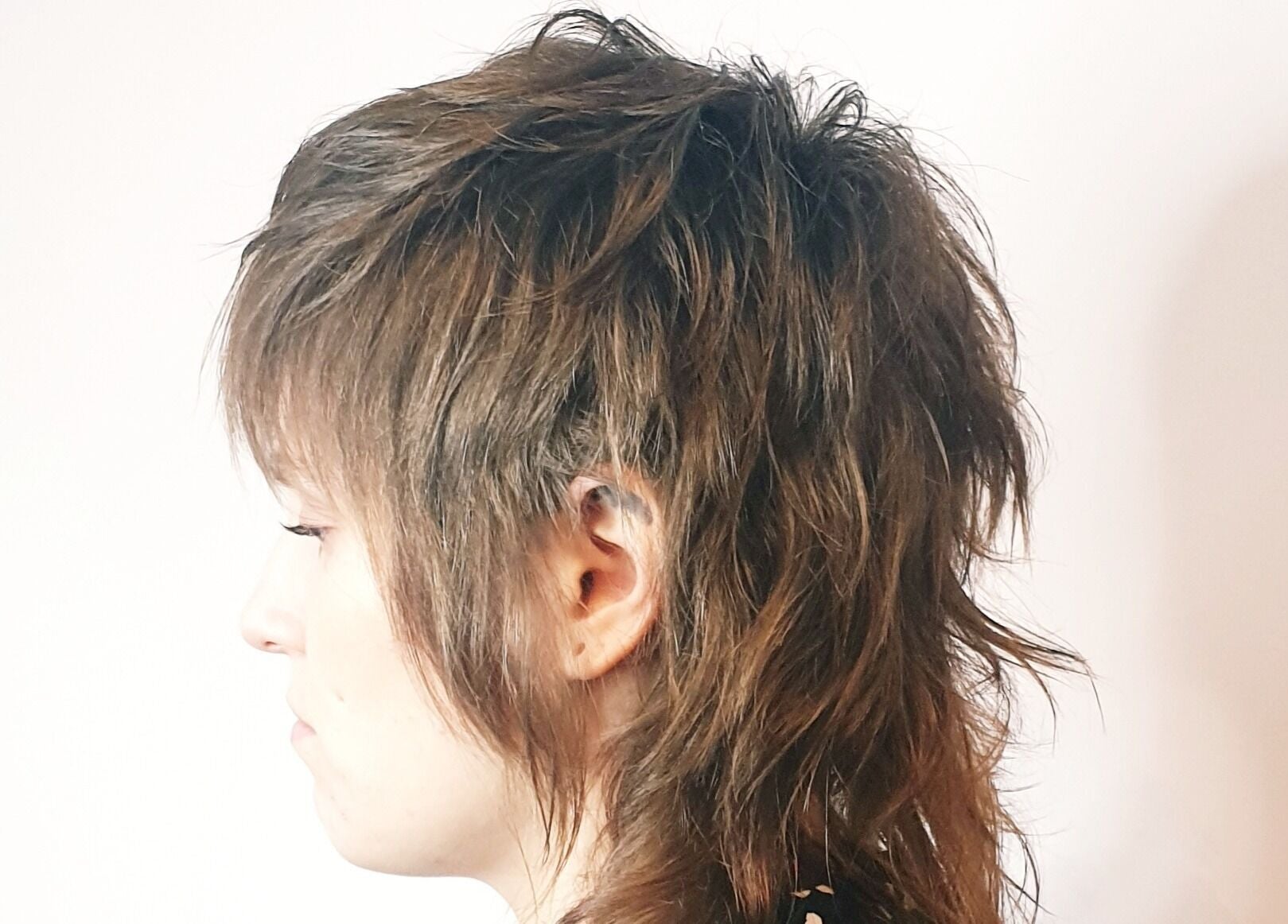 Chic layered shag hairstyle showcased at Louise Frances, Derby, England, GB.