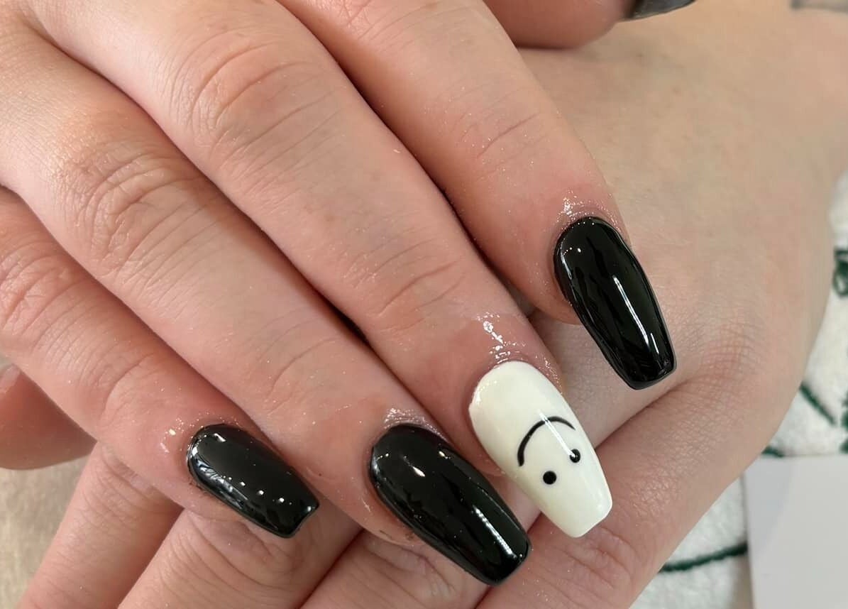 Stylish black and white nails with art detail at D.T Nails Spa Yarrabilba, in Yarrabilba, Queensland, AU.