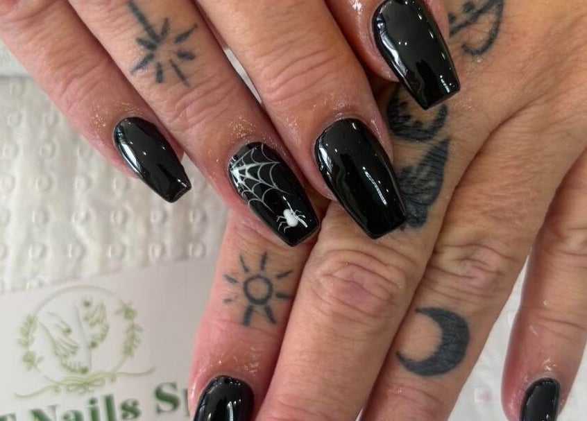 Chic black manicure with spider web design at D.T Nails Spa Yarrabilba, Yarrabilba, Queensland, AU.