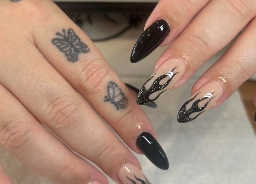 Stylish black flame nail art by D.T Nails Spa Yarrabilba in Yarrabilba, Queensland, AU.