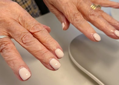 Fresh manicure at Central Park Chinese Massage and Nails, Melbourne, Victoria, AU; showcasing glossy pale nails.