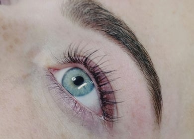 Close-up of eye showcasing lash lift at Sunset Tanning & Aesthetics, Mosgiel, Otago, NZ.