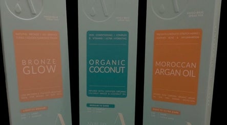 Diverse spray tan options at Sunset Tanning & Aesthetics in Mosgiel, Otago, NZ offering Bronze, Coconut, Argan.