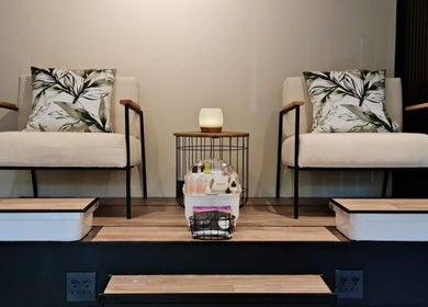 Cozy spa chairs at Sweet Escape Beauty, Sandton, Gauteng, ZA with plush cushions and a serene setting.