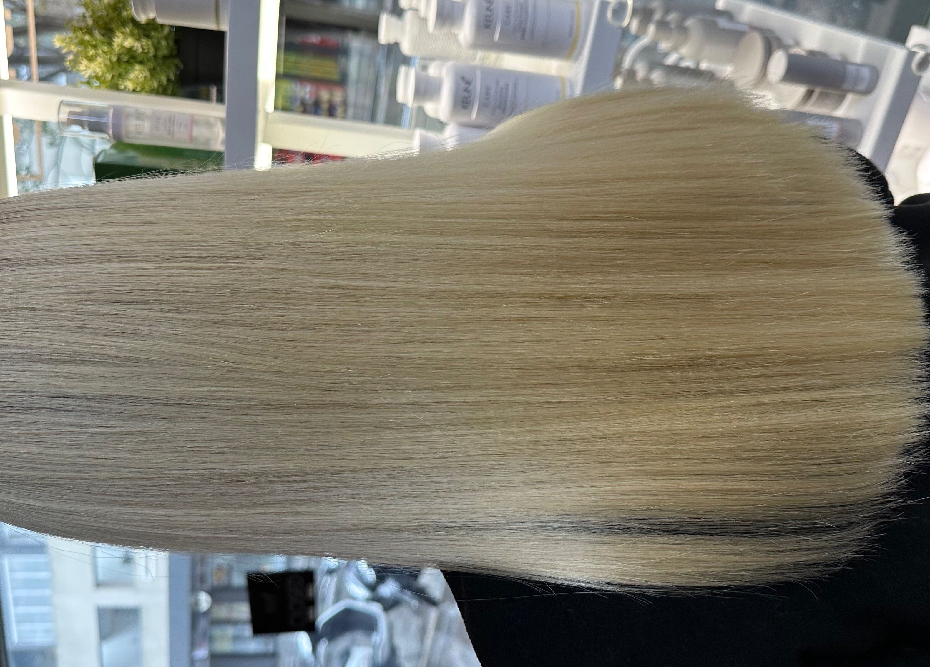 Silky straight blonde hair at Hair by Clement in Sydney, New South Wales, AU.