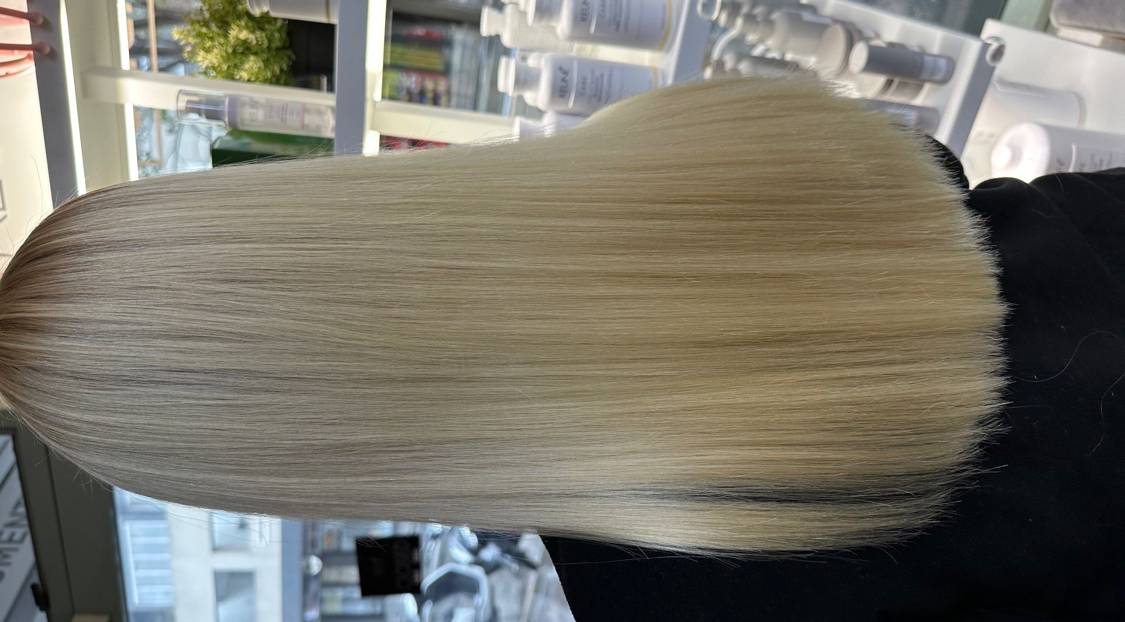 Silky straight blonde hair at Hair by Clement in Sydney, New South Wales, AU.