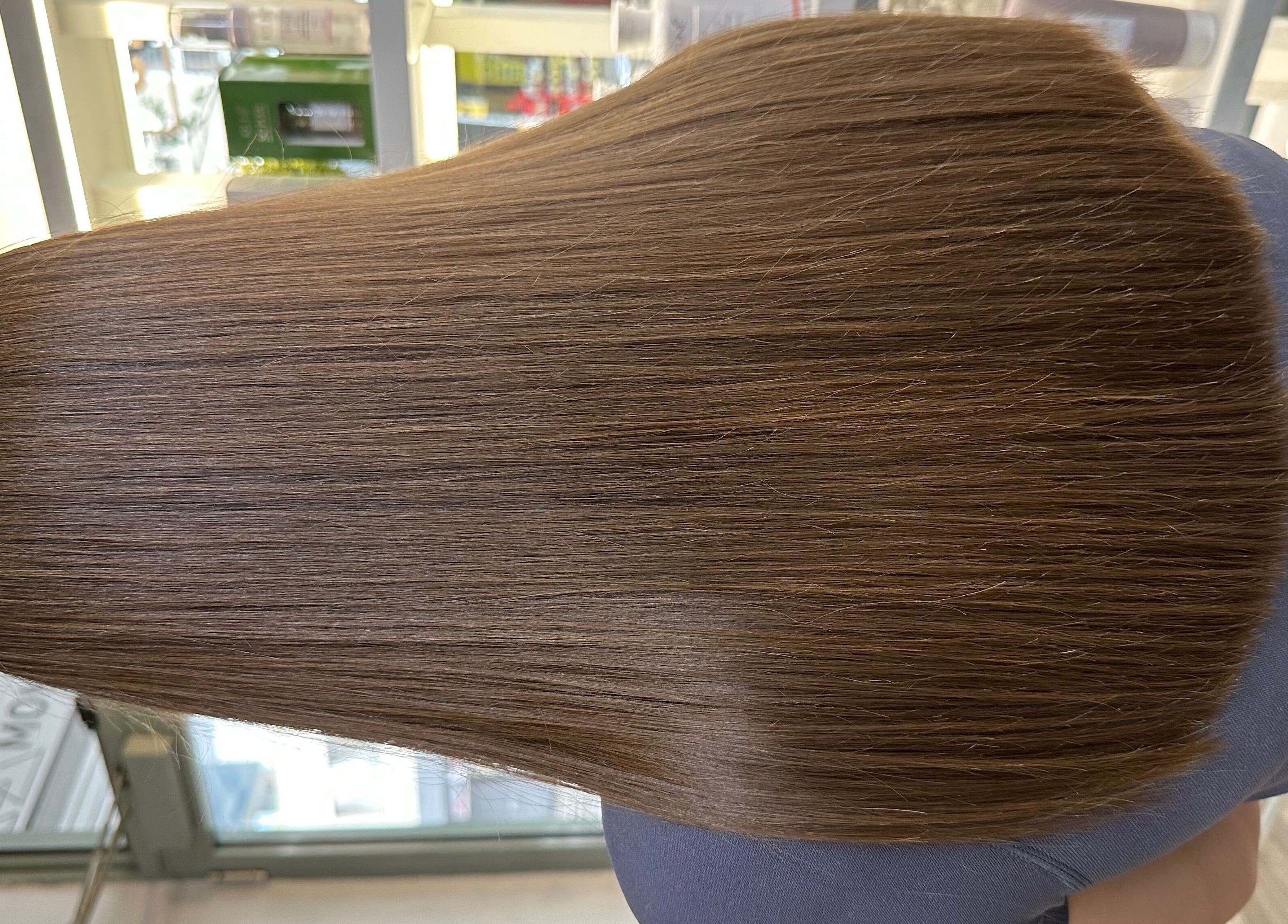 Glossy brown hair transformation at Hair by Clement, Sydney, New South Wales, AU, showcasing expert styling.