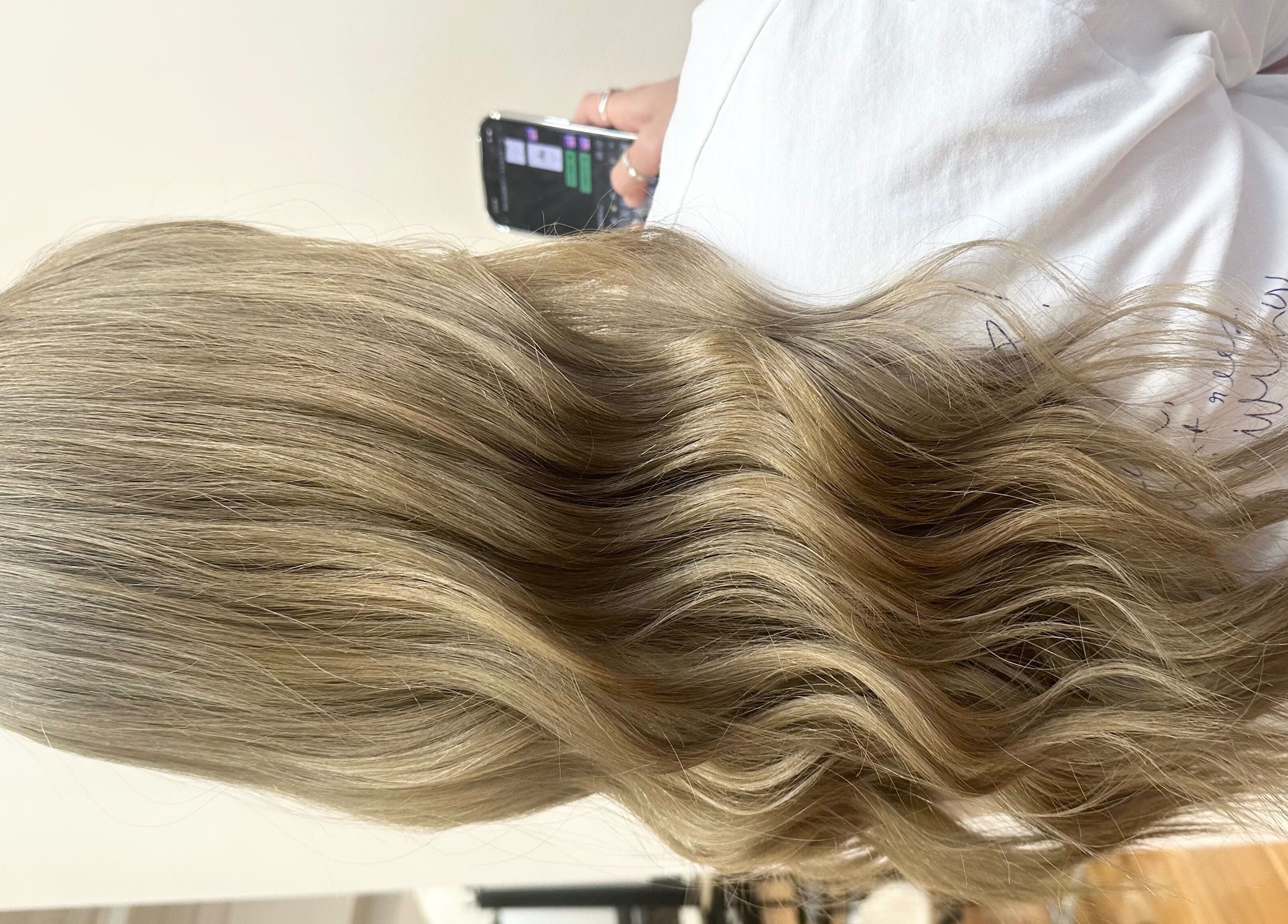Beautiful wavy blonde hair styled at Hair by Clement, Sydney, New South Wales, AU.
