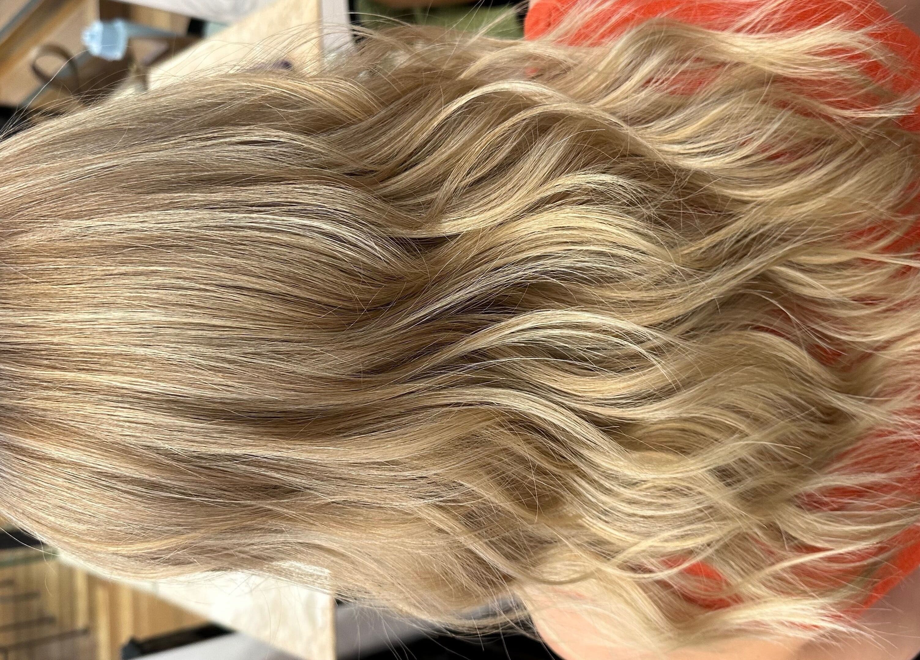 Blonde wavy hair styling at Hair by Clement, Sydney, New South Wales, AU.