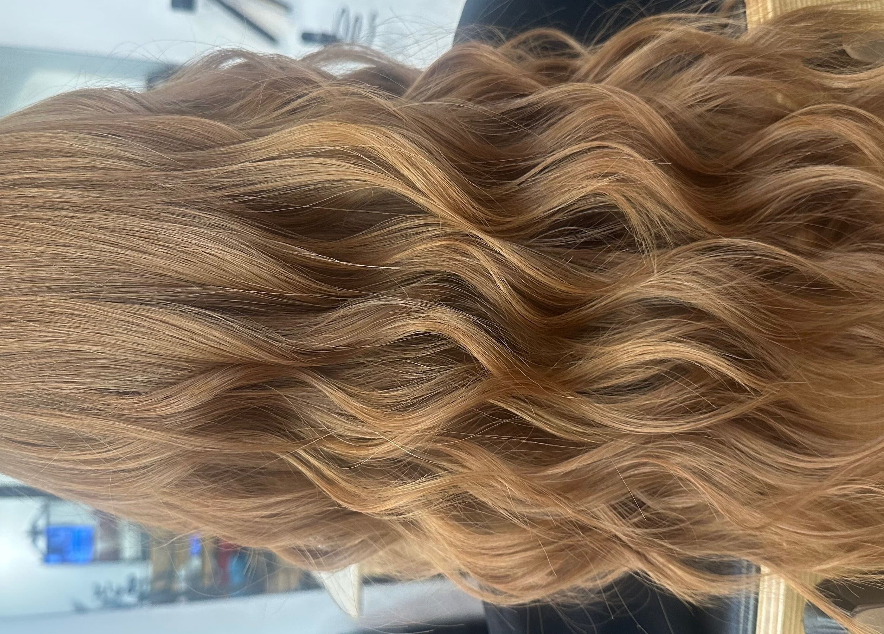 Beautiful wavy golden hair styled at Hair by Clement, Sydney, New South Wales, AU.