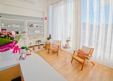 Bright, cozy lounge area at The Lash Squad in Melbourne, Victoria, AU, featuring elegant decor and natural light.