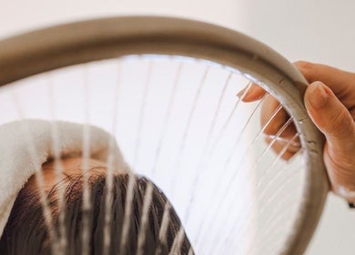 A soothing head massage setup at The Lash Squad in Melbourne, Victoria, AU featuring calming techniques.