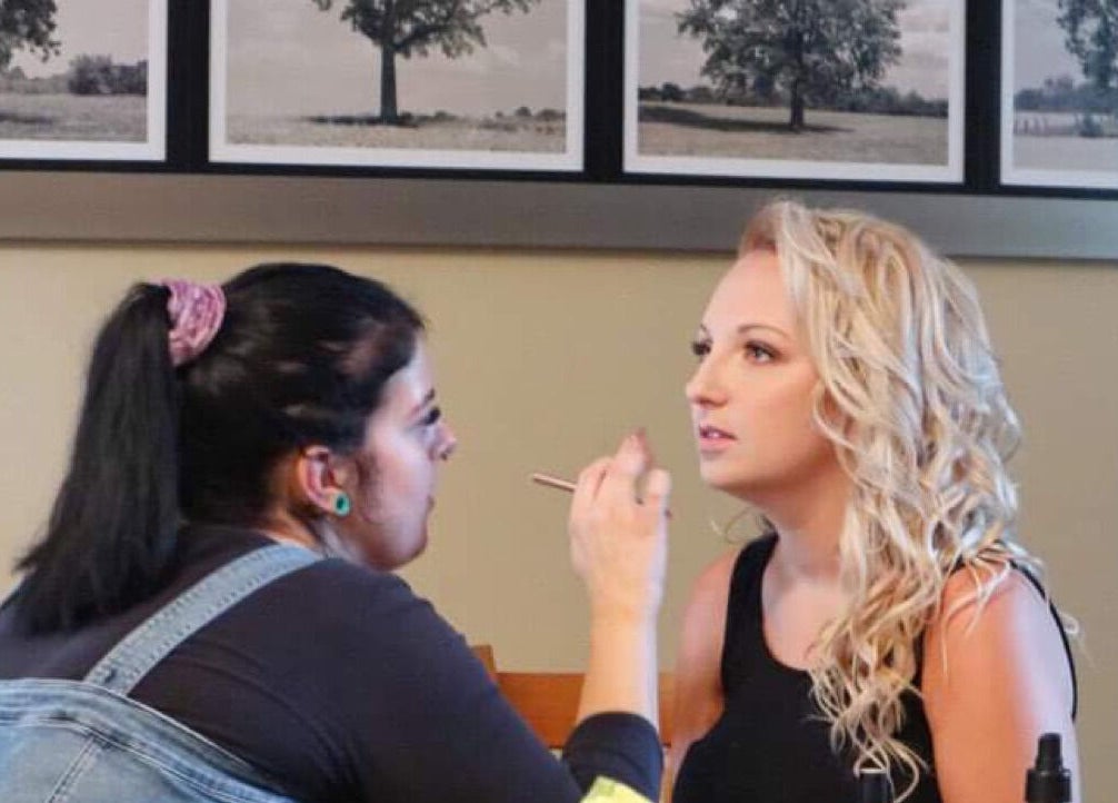 Makeup artist working on a client at Daisy Lane Esthetics, Port Alberni, British Columbia, CA.