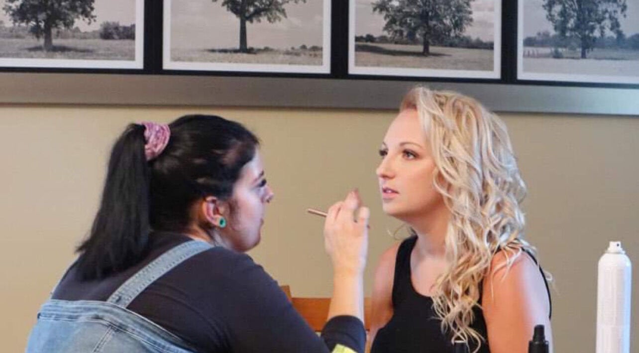 Makeup artist working on a client at Daisy Lane Esthetics, Port Alberni, British Columbia, CA.