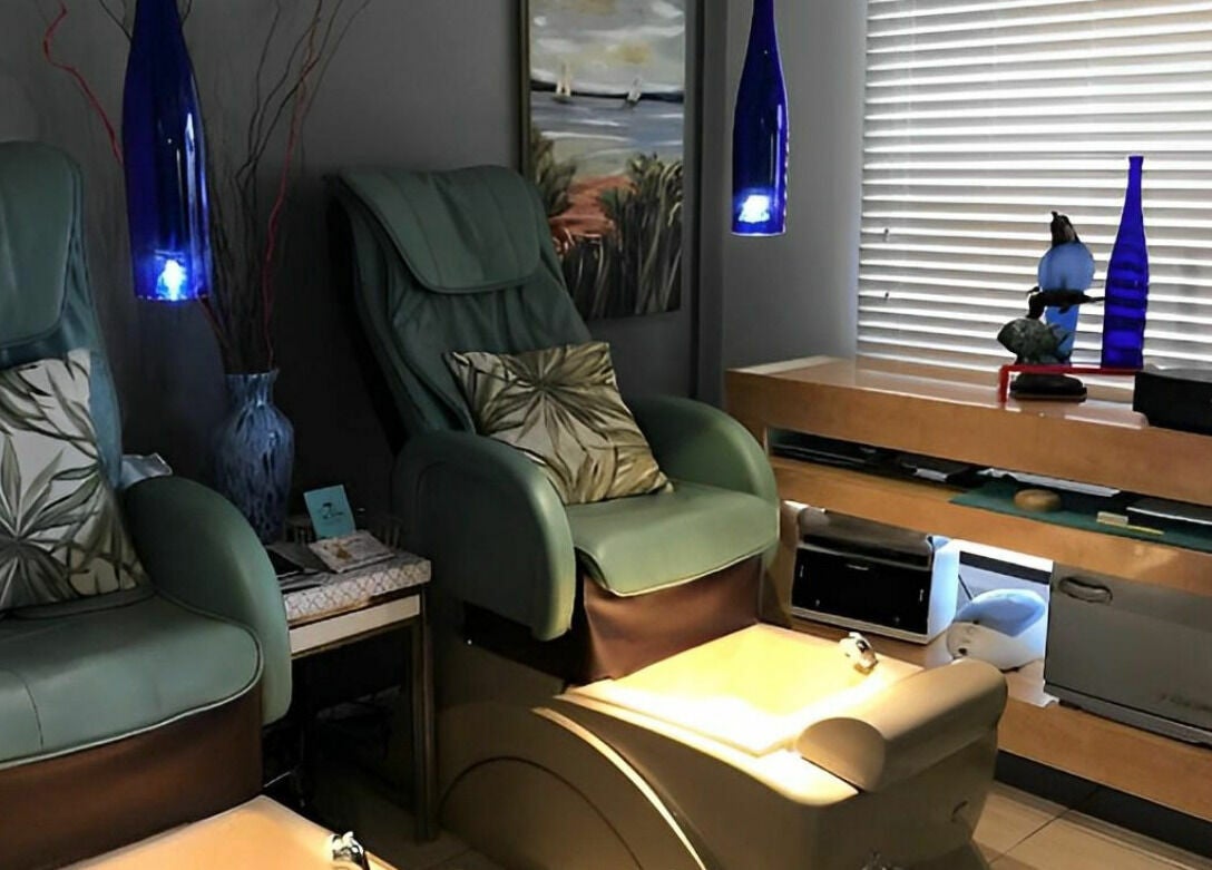 Luxurious spa chairs at The Palms Salon and Day Spa, LLC, Edgewater, Florida, US, offering a serene retreat.