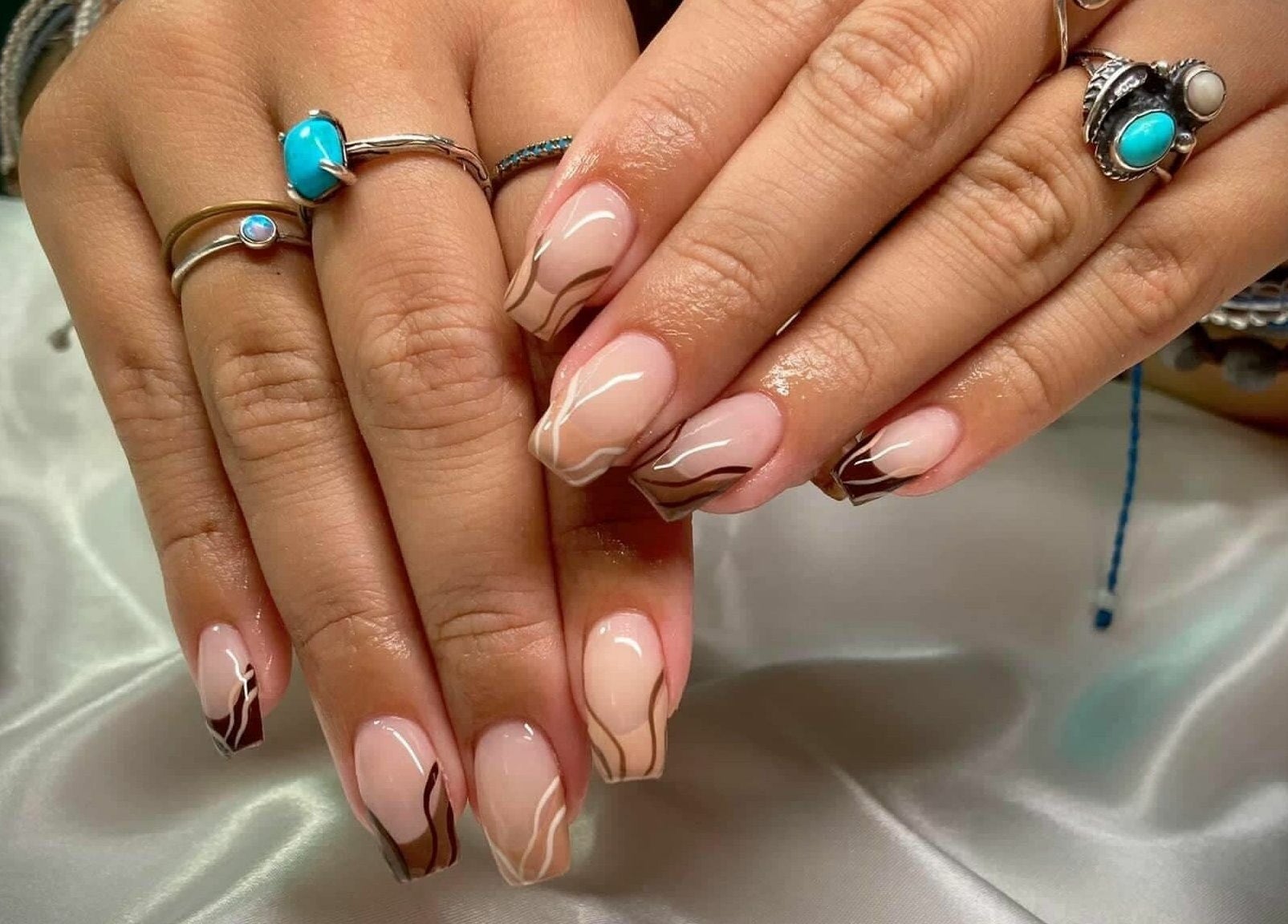 Elegant nail art at The Palms Salon and Day Spa, LLC, Edgewater, Florida, US showcasing intricate designs.