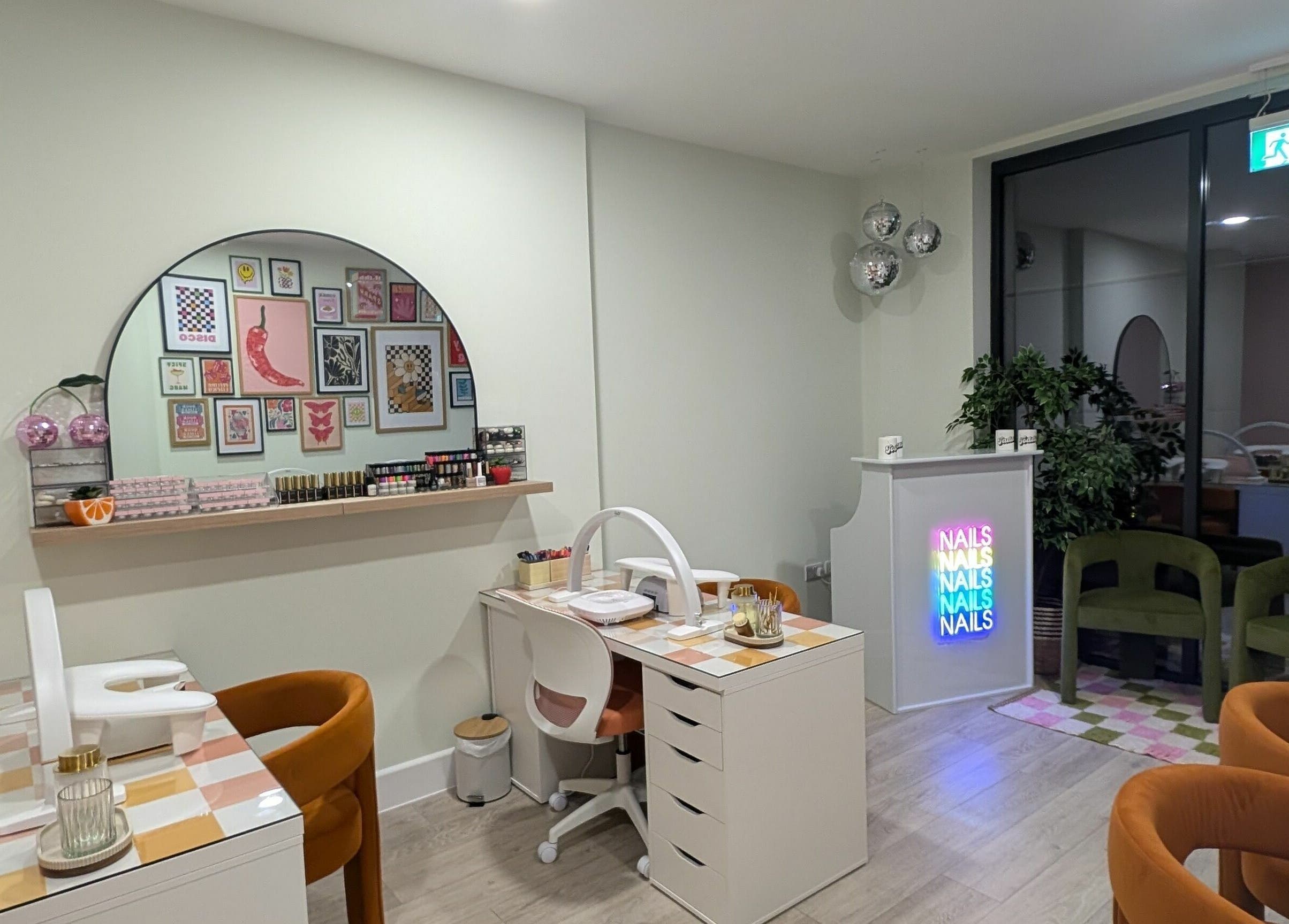 Modern interior of Toddy's Nails Wadebridge, showcasing chic nail stations in Wadebridge, England, GB.