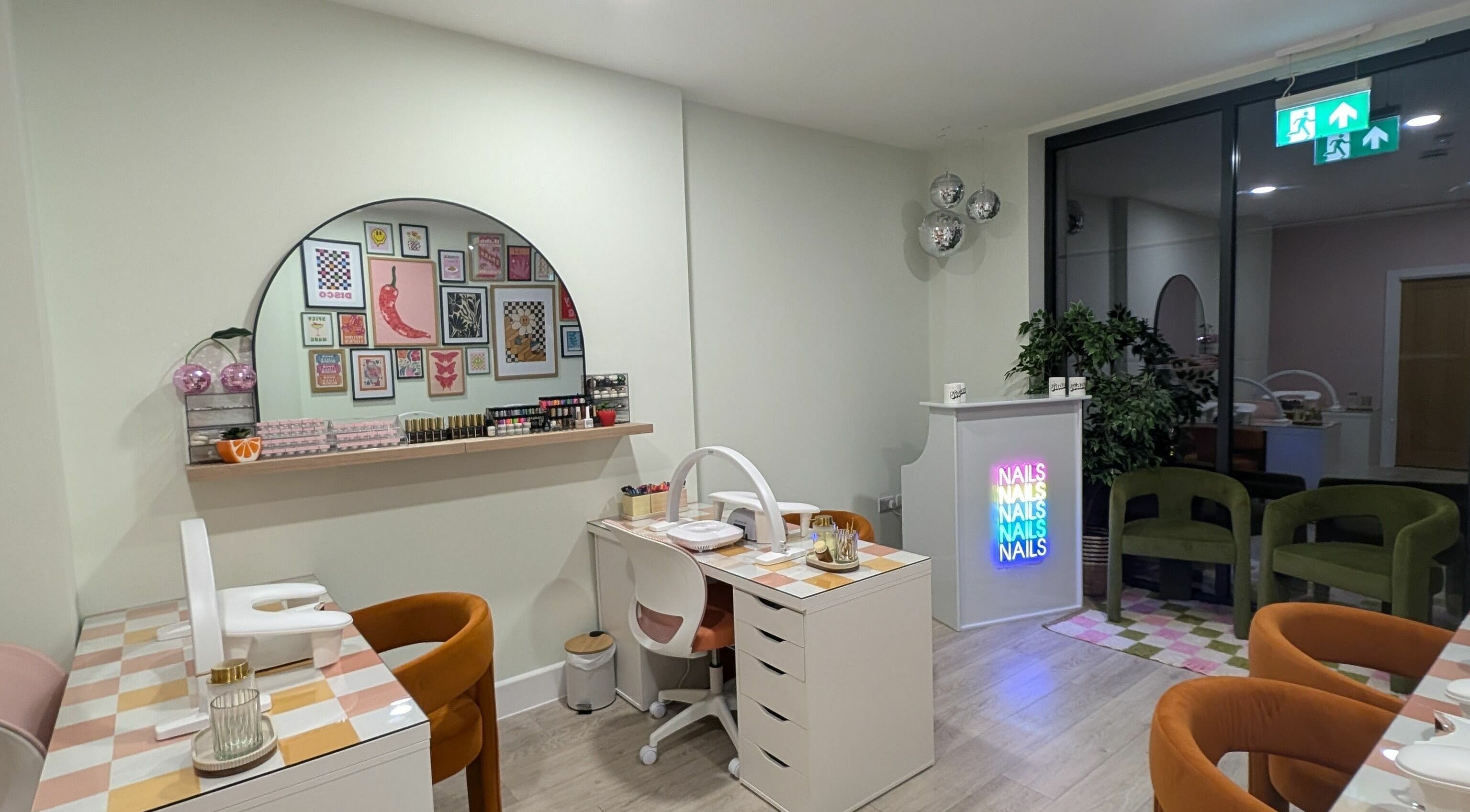 Modern interior of Toddy's Nails Wadebridge, showcasing chic nail stations in Wadebridge, England, GB.