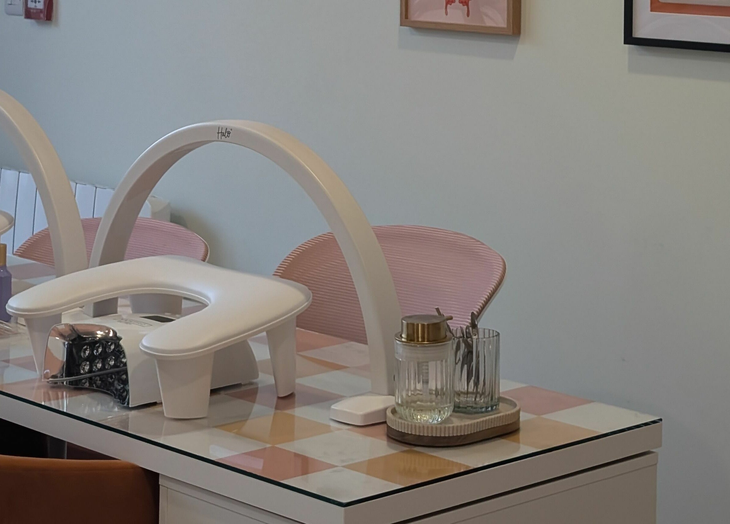 Modern nail station at Toddy's Nails Wadebridge, Wadebridge, England, GB features stylish seating and manicure tools.