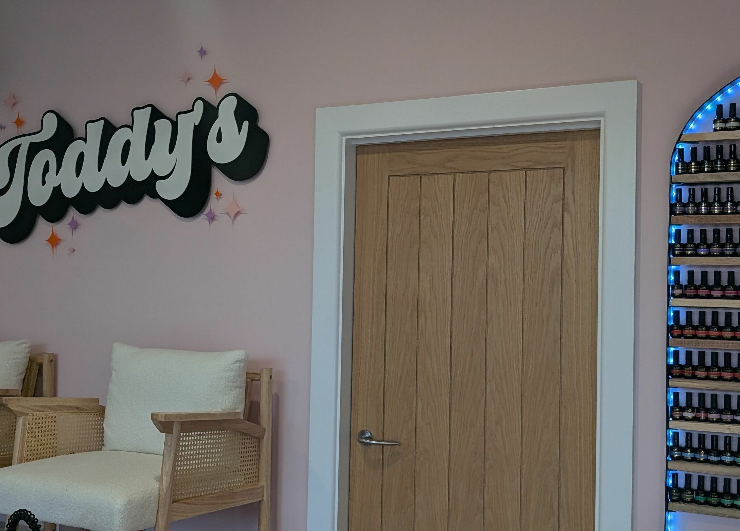 Cozy seating and nail polish display at Toddy's Nails Wadebridge in Wadebridge, England, GB.