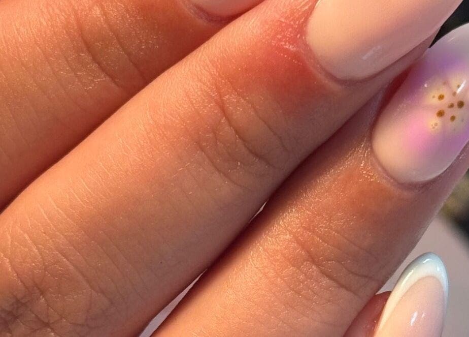 Close-up of floral nail art at Nail Pod Derby, Derby, England, GB, showcasing delicate design.