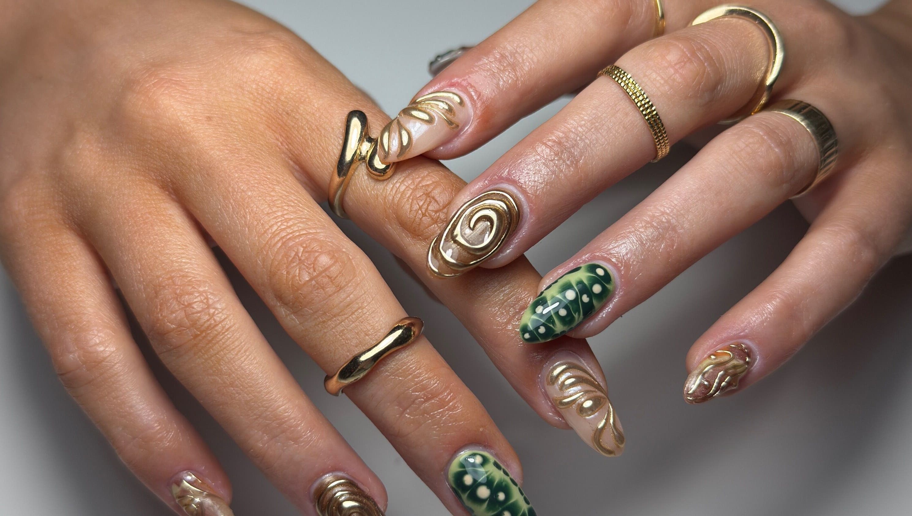 Stunning gold swirl nails at Ella Boo Nails in Tweed Heads South, New South Wales, AU.