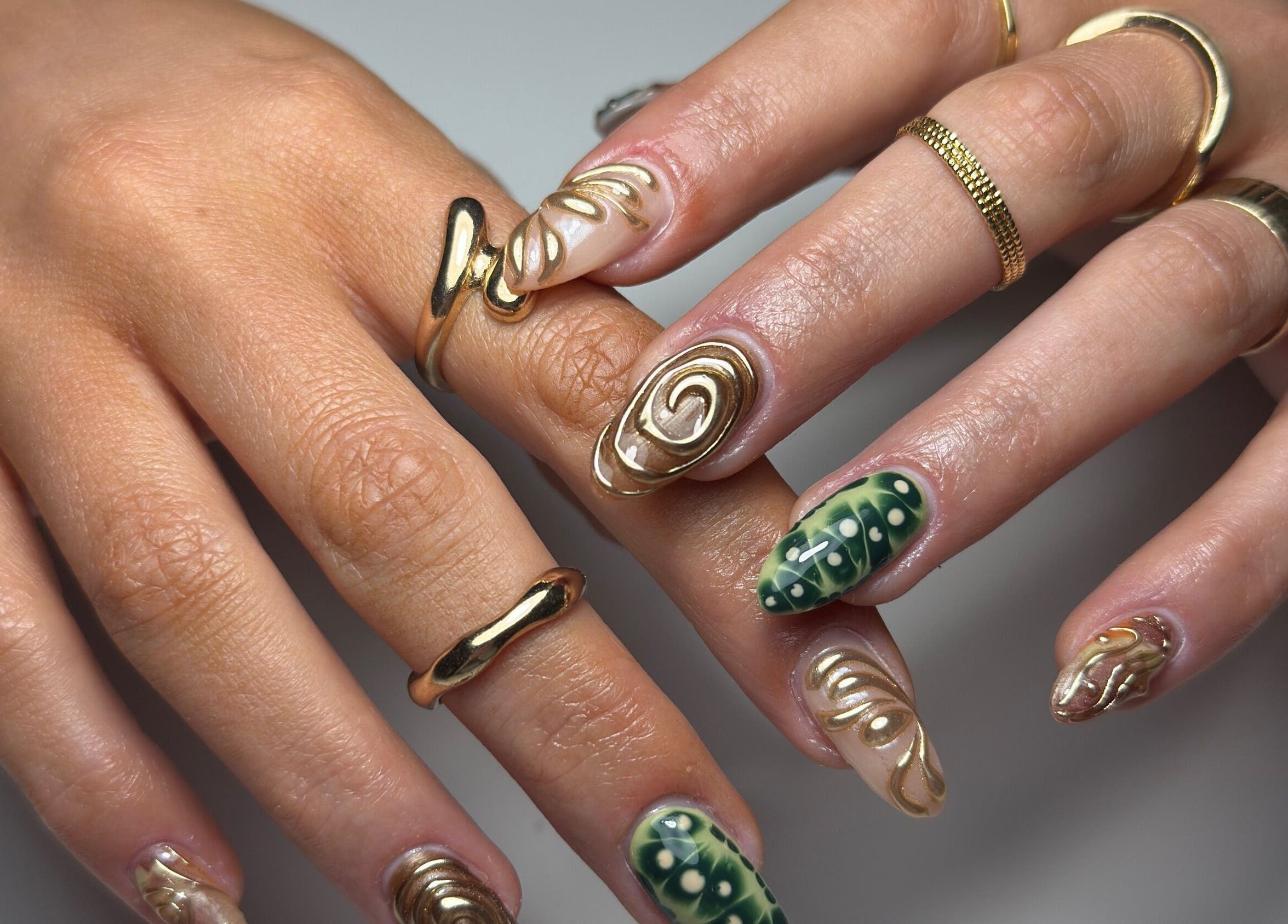 Stunning gold swirl nails at Ella Boo Nails in Tweed Heads South, New South Wales, AU.