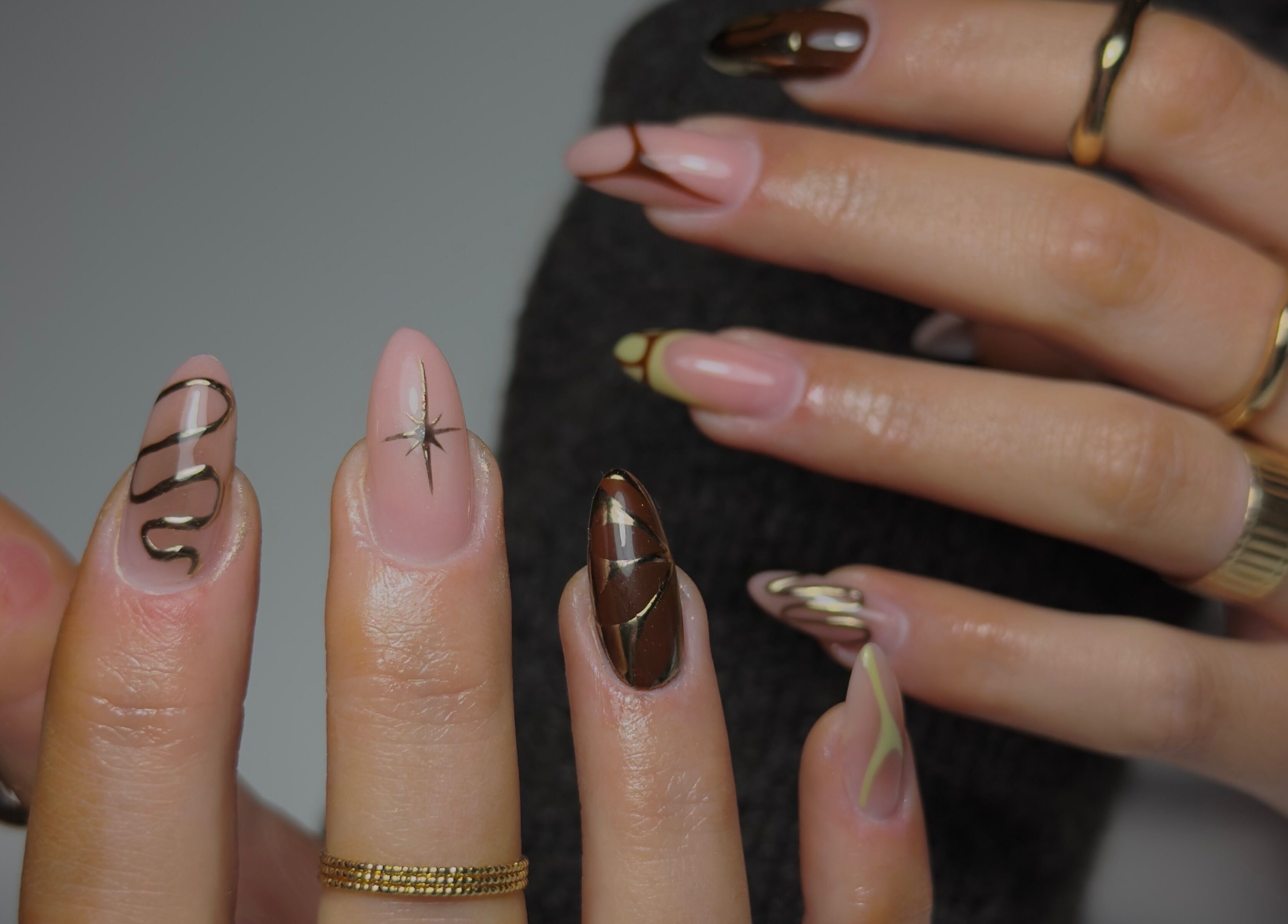 Intricate nail art at Ella Boo Nails, Tweed Heads South, New South Wales. Elegant designs on well-manicured hands.