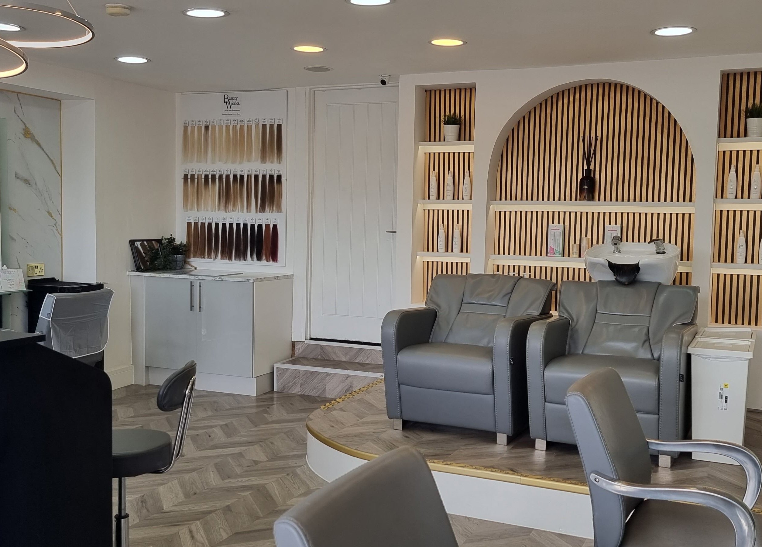 Chic salon seating at HairArt_bydennileigh in Eccles, England, GB showcasing modern hair products.