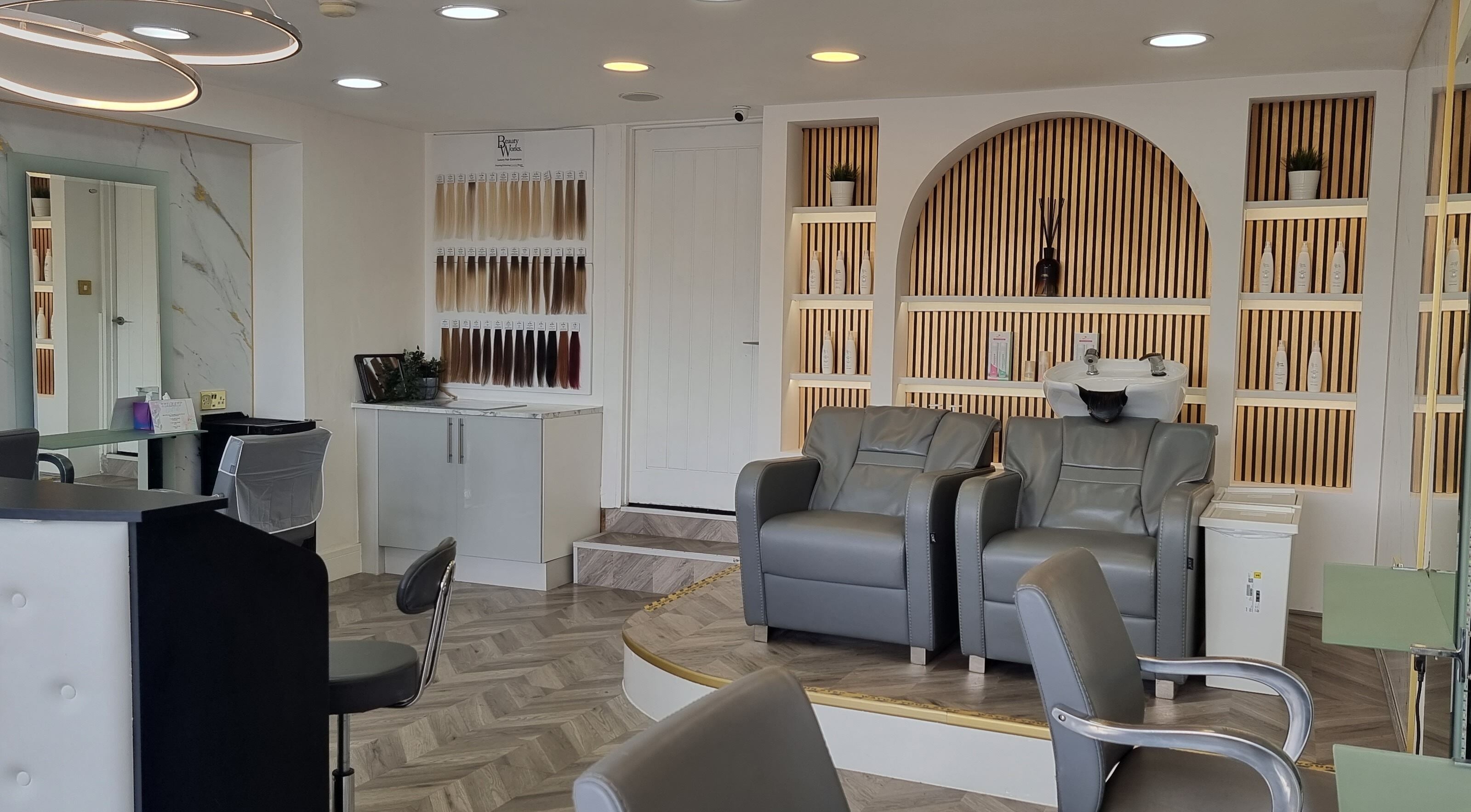 Chic salon seating at HairArt_bydennileigh in Eccles, England, GB showcasing modern hair products.