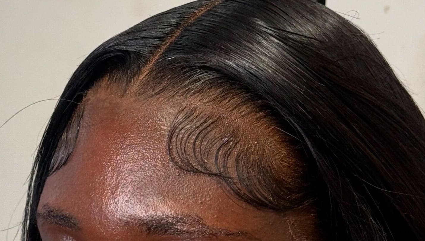 Close-up of sleek hairstyle at Alacedit, Oldham, England, GB showcasing refined hairline.