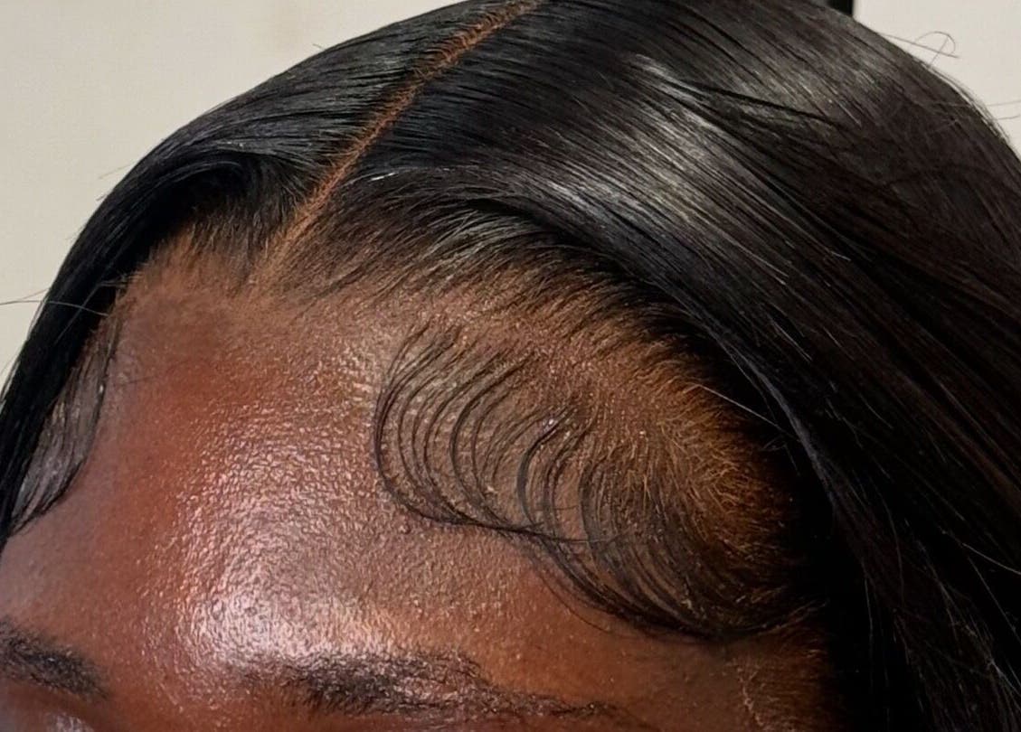 Close-up of sleek hairstyle at Alacedit, Oldham, England, GB showcasing refined hairline.