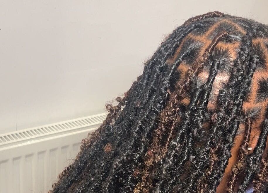 Detailed braiding style at Alacedit, Oldham, England, GB showcasing intricate patterns.