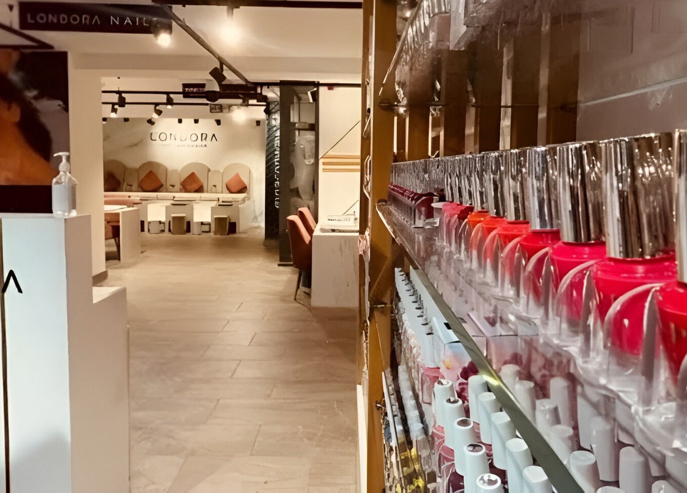 Vibrant nail polishes and chic interior at Londora Nail Boutique, London, England, GB.