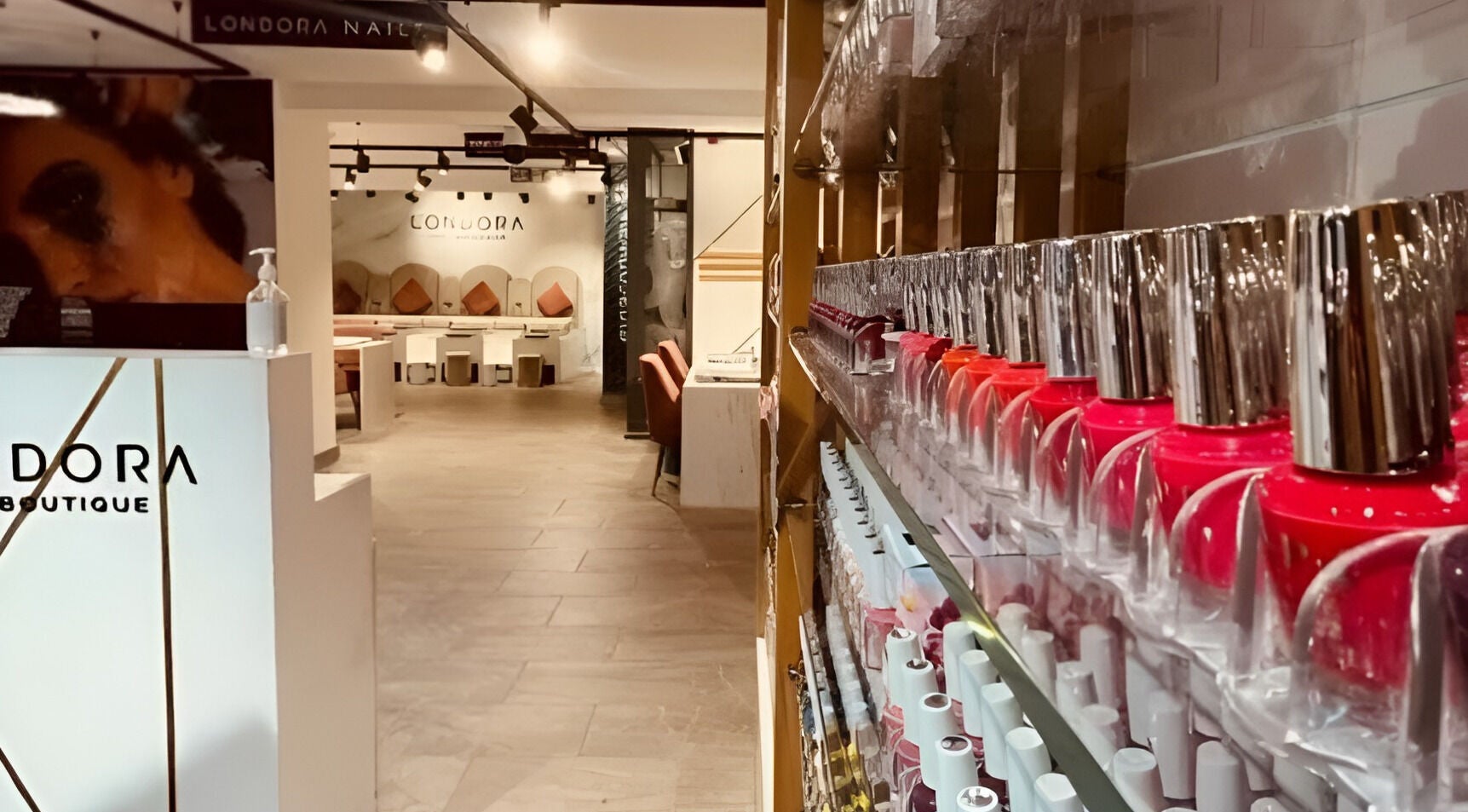Vibrant nail polishes and chic interior at Londora Nail Boutique, London, England, GB.