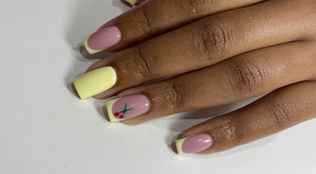 Pastel nails with pink and yellow at Glamorous nails by Jd, Midrand, Gauteng, ZA. Artistic flair in nail art.