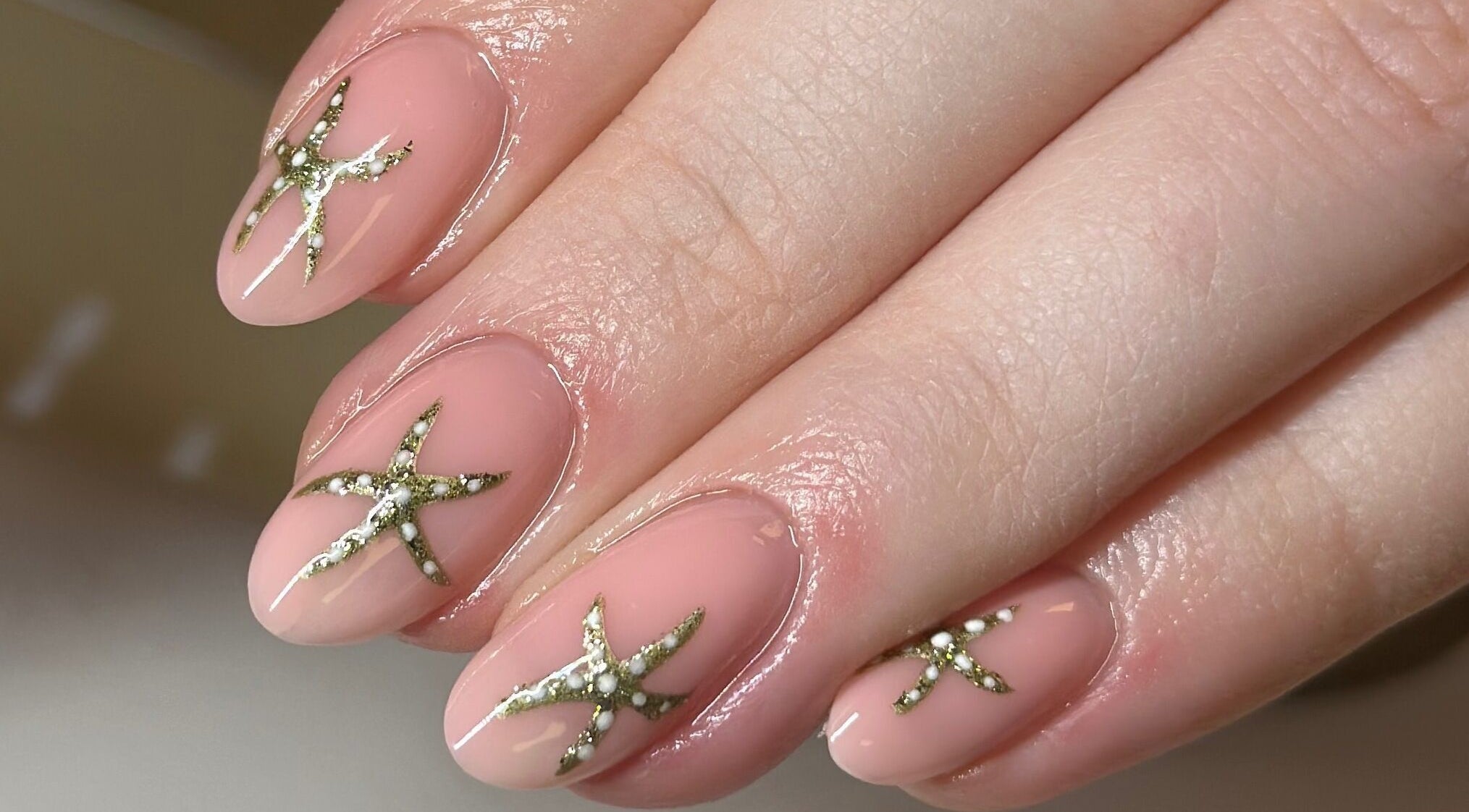 Elegant star-patterned nails at Twenty two the studio, Chelmsford, England, GB.