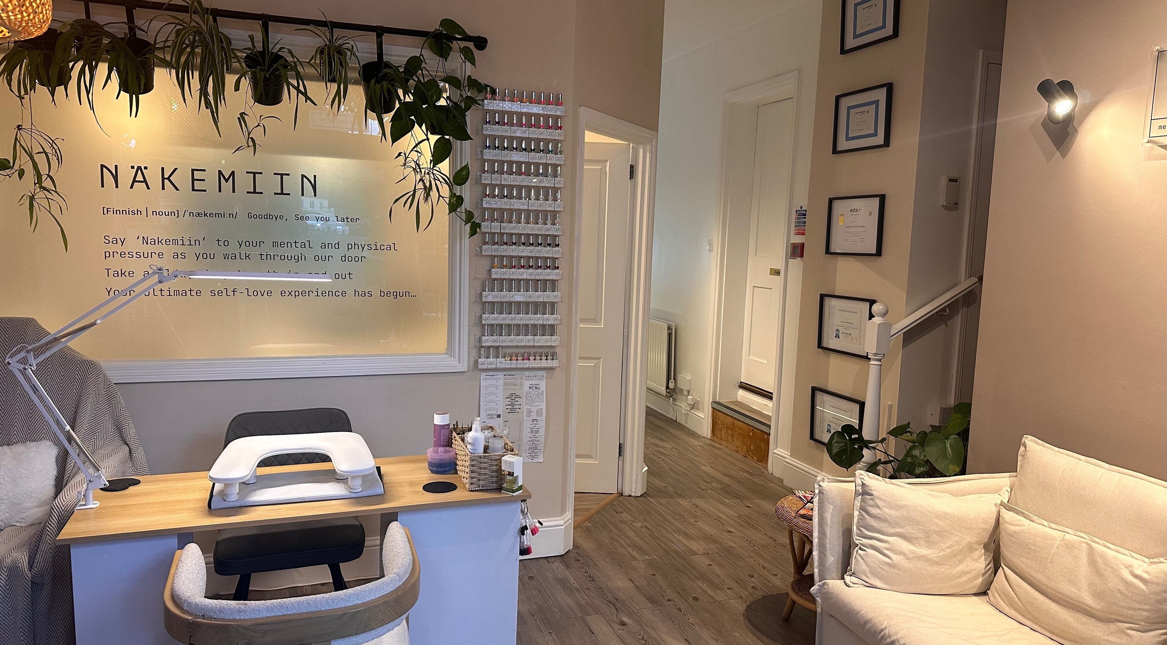 Cozy interior of Näkemiin in Harrold, England, GB, featuring a stylish manicure station and decor.