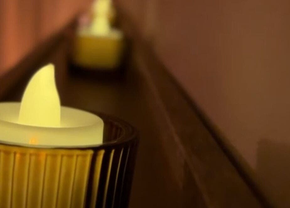 Candlelit atmosphere at Näkemiin, Harrold, England, GB, creating a warm, inviting spa ambiance.