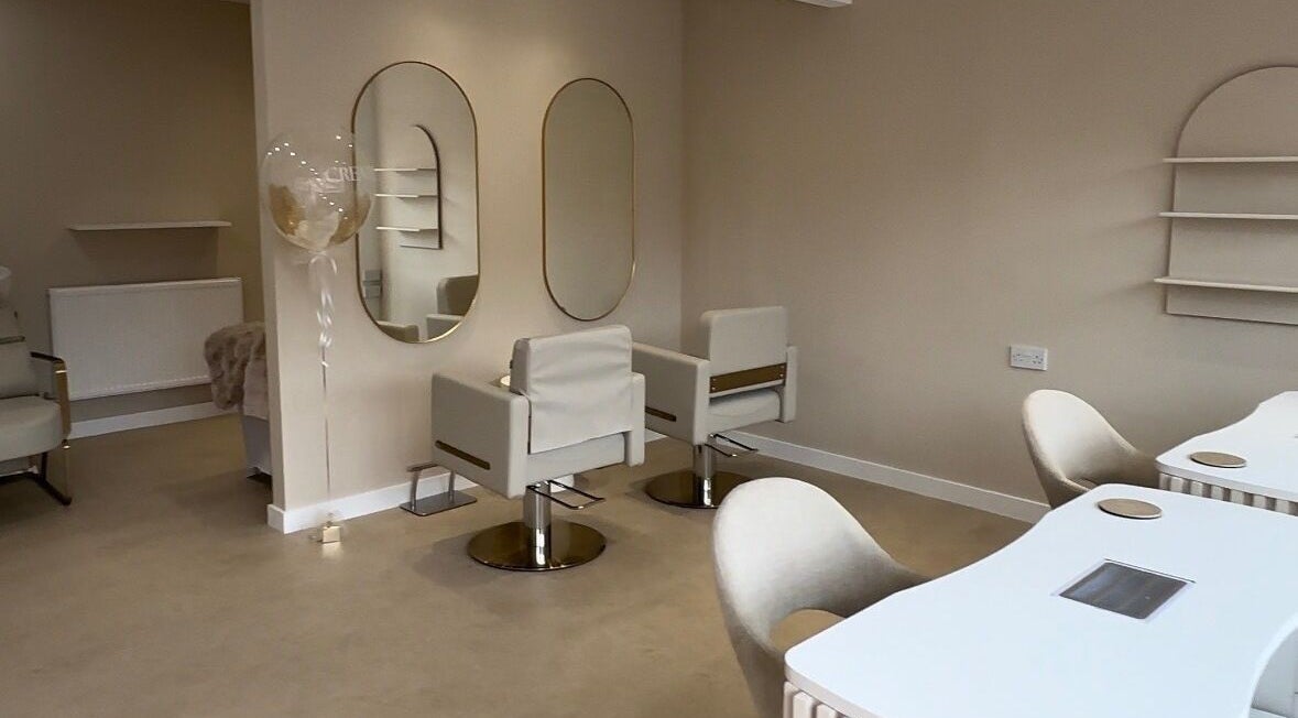Chic and modern interior of Created salon in Swinton, England, GB with stylish mirrors and seating.
